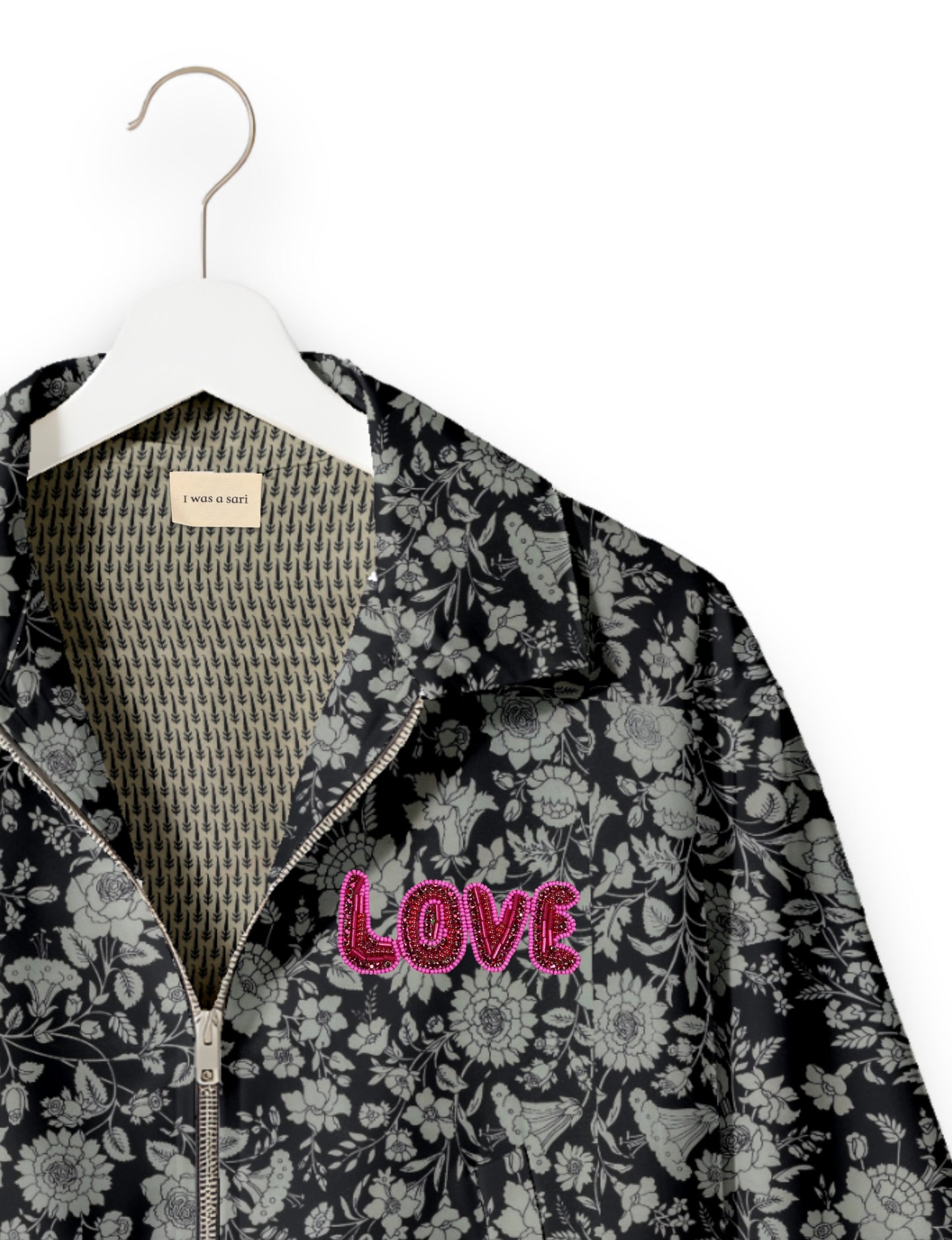 Love Bomber Jacket made from recycled fabric, featuring hand-stitched Aari embroidery. A unique piece of zero-waste clothing, part of the circular fashion movement. Designed with upcycled materials for a stylish yet environmentally friendly clothing choice.