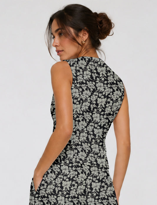 Women's fitted waistcoat with V-neck, single-breasted button closure, tailored silhouette, and pointed hem in sustainable fashion.