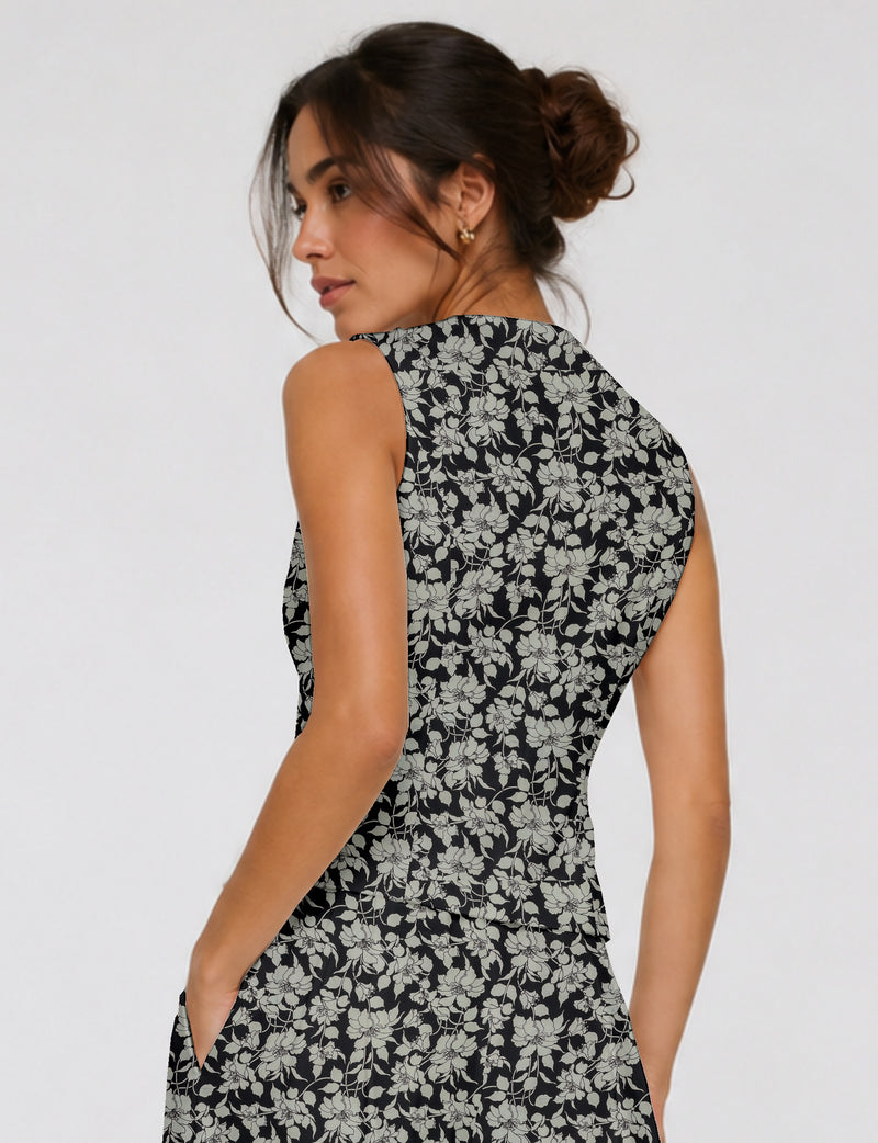 Women's fitted waistcoat with V-neck, single-breasted button closure, tailored silhouette, and pointed hem in sustainable fashion.