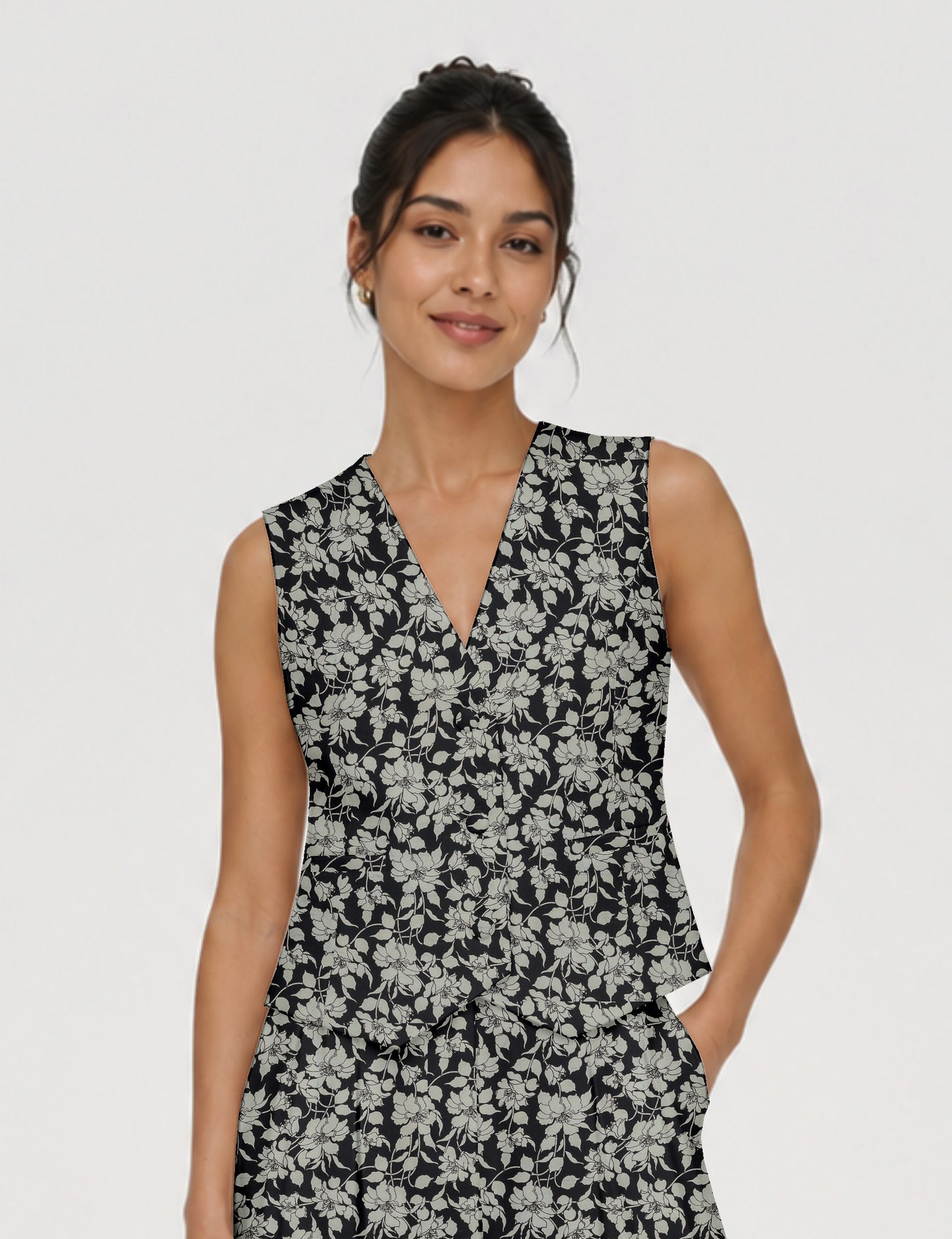 Women's fitted waistcoat with V-neck, single-breasted button closure, tailored silhouette, and pointed hem in sustainable fashion.