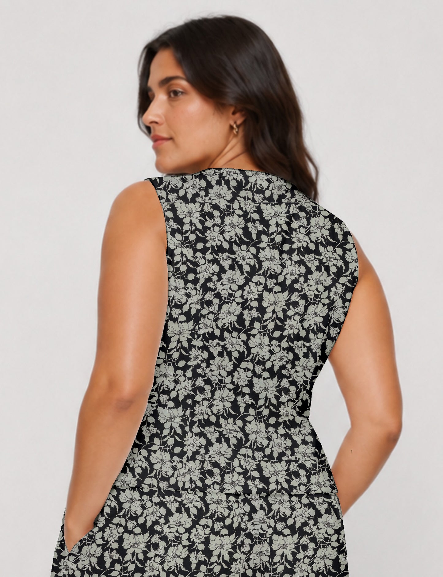 Women's fitted waistcoat with V-neck, single-breasted button closure, tailored silhouette, and pointed hem in sustainable fashion.