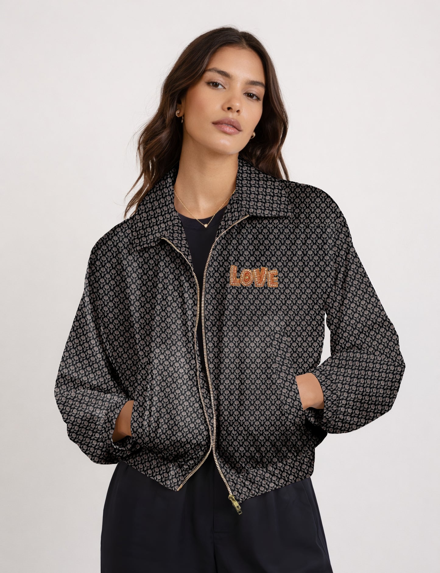 Love Bomber Jacket made from recycled fabric, featuring hand-stitched Aari embroidery. A unique piece of zero-waste clothing, part of the circular fashion movement. Designed with upcycled materials for a stylish yet environmentally friendly clothing choice.