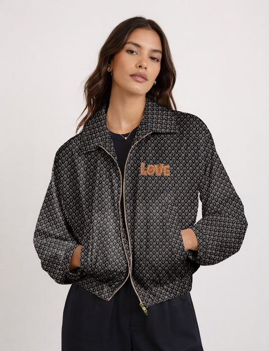 Love Bomber Jacket made from recycled fabric, featuring hand-stitched Aari embroidery. A unique piece of zero-waste clothing, part of the circular fashion movement. Designed with upcycled materials for a stylish yet environmentally friendly clothing choice.