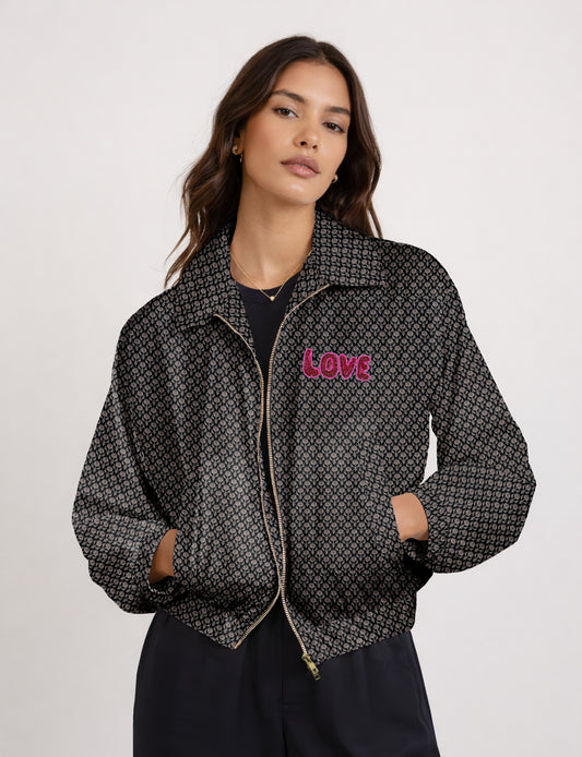 Love Bomber Jacket made from recycled fabric, featuring hand-stitched Aari embroidery. A unique piece of zero-waste clothing, part of the circular fashion movement. Designed with upcycled materials for a stylish yet environmentally friendly clothing choice.
