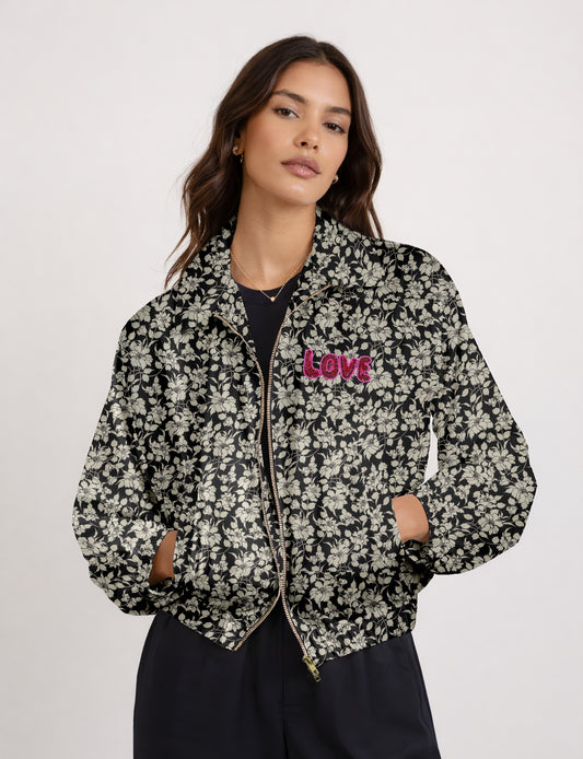 Love Bomber Jacket made from recycled fabric, featuring hand-stitched Aari embroidery. A unique piece of zero-waste clothing, part of the circular fashion movement. Designed with upcycled materials for a stylish yet environmentally friendly clothing choice.