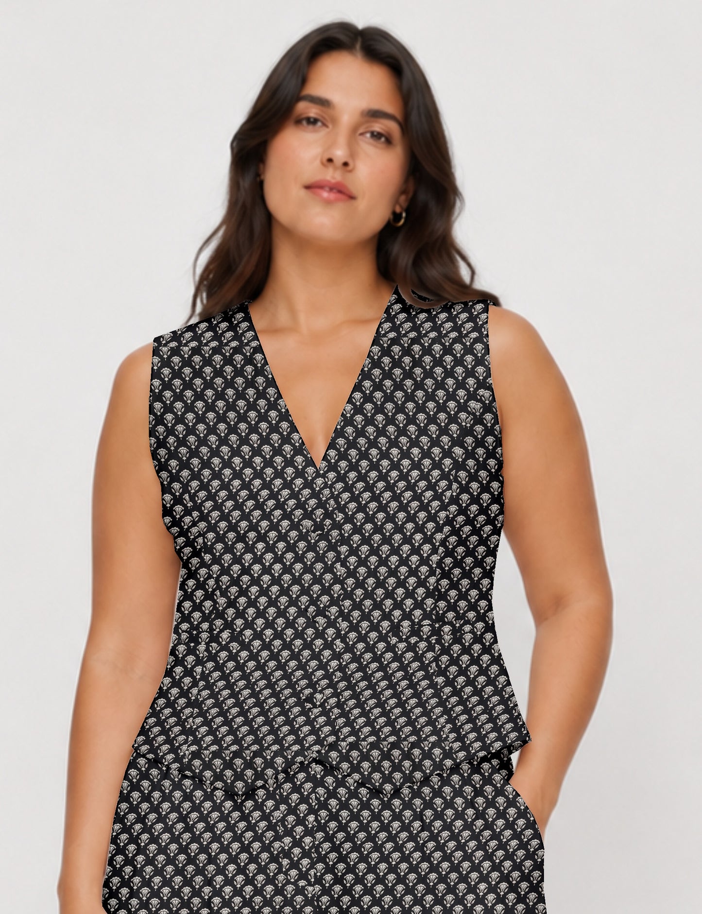 Women's fitted waistcoat with V-neck, single-breasted button closure, tailored silhouette, and pointed hem in sustainable fashion.