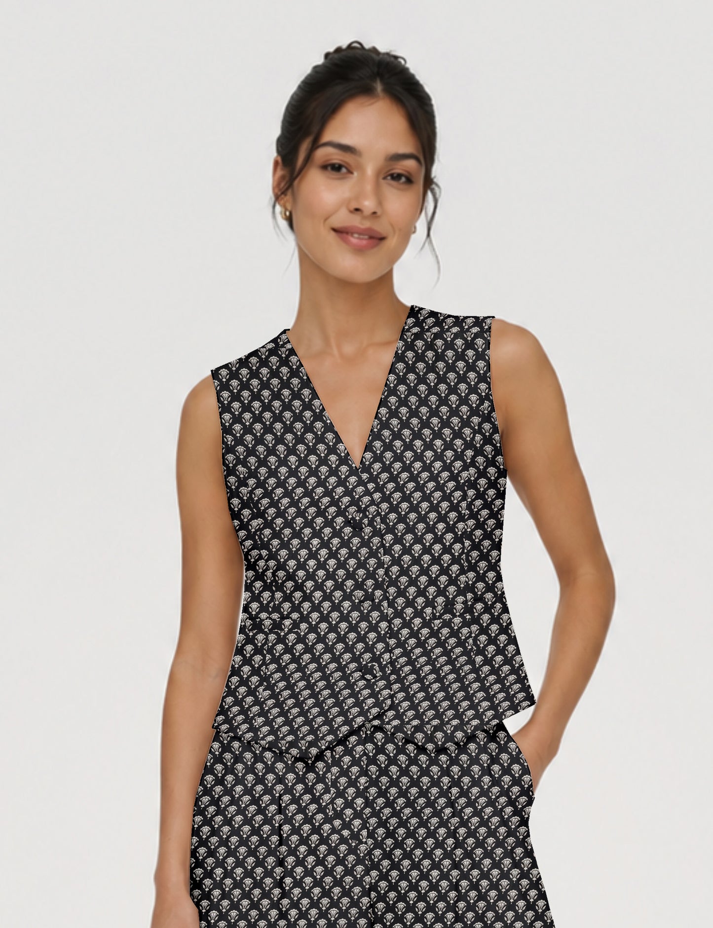 Women's fitted waistcoat with V-neck, single-breasted button closure, tailored silhouette, and pointed hem in sustainable fashion.