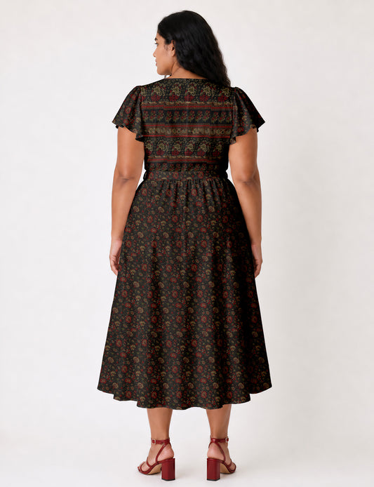 Elegant midi wrap dress with a V-neckline, adjustable waist tie, fitted bodice, and flared skirt for a timeless, flattering silhouette.