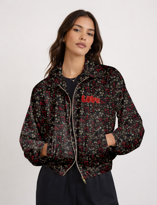 Love Bomber Jacket made from recycled fabric, featuring hand-stitched Aari embroidery. A unique piece of zero-waste clothing, part of the circular fashion movement. Designed with upcycled materials for a stylish yet environmentally friendly clothing choice.