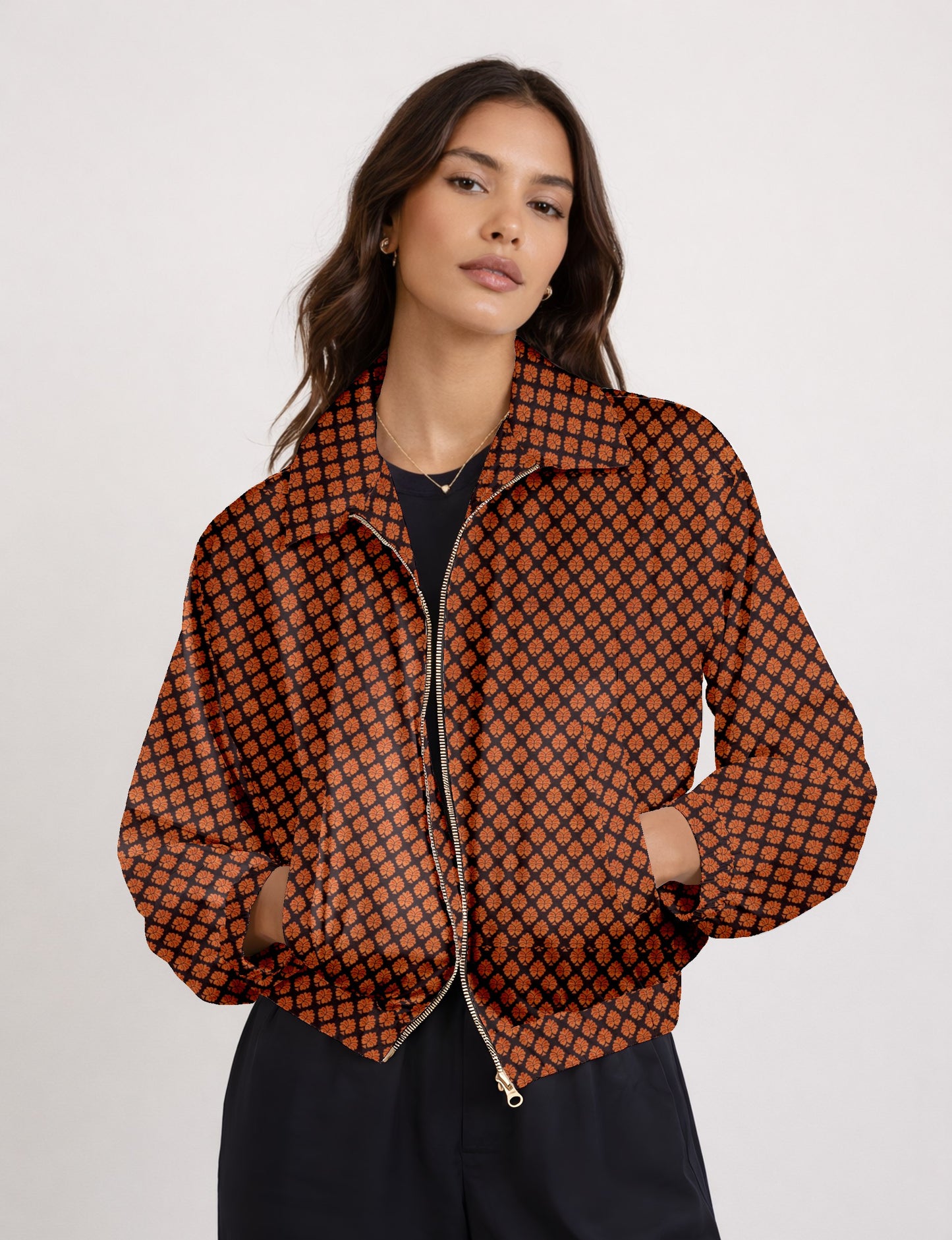 Upcycled Bomber Jacket made from recycled sari materials, featuring a cute cropped shape, elasticated hem and cuffs, and contrast sari print lining. Sustainable apparel promoting eco-friendly fashion and ethical clothing.