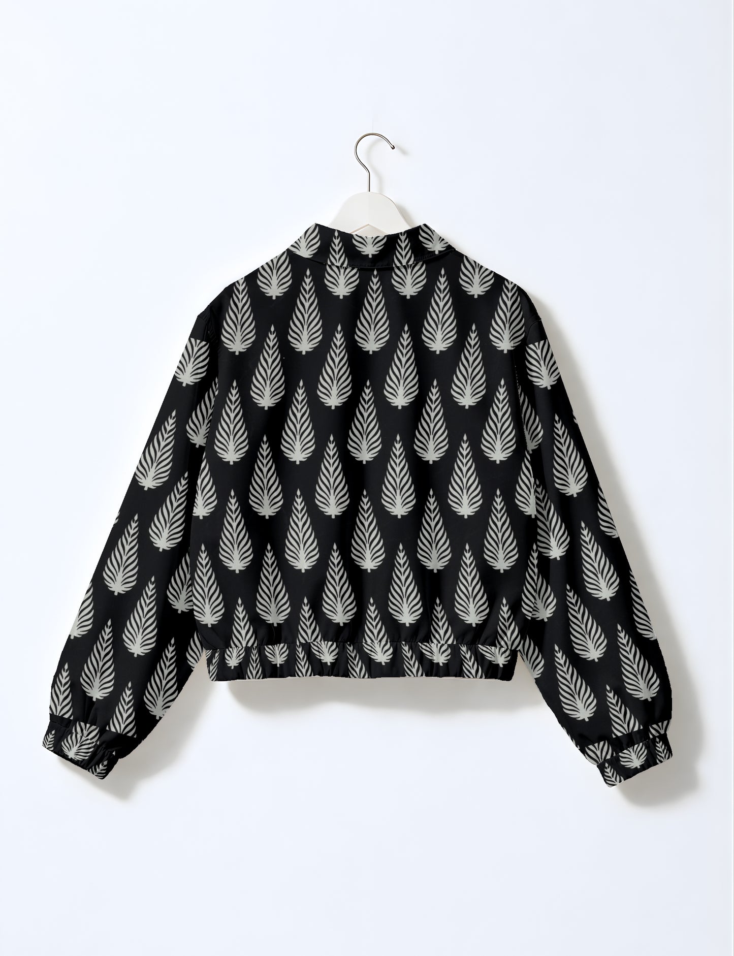 Upcycled Bomber Jacket made from recycled sari materials, featuring a cute cropped shape, elasticated hem and cuffs, and contrast sari print lining. Sustainable apparel promoting eco-friendly fashion and ethical clothing.