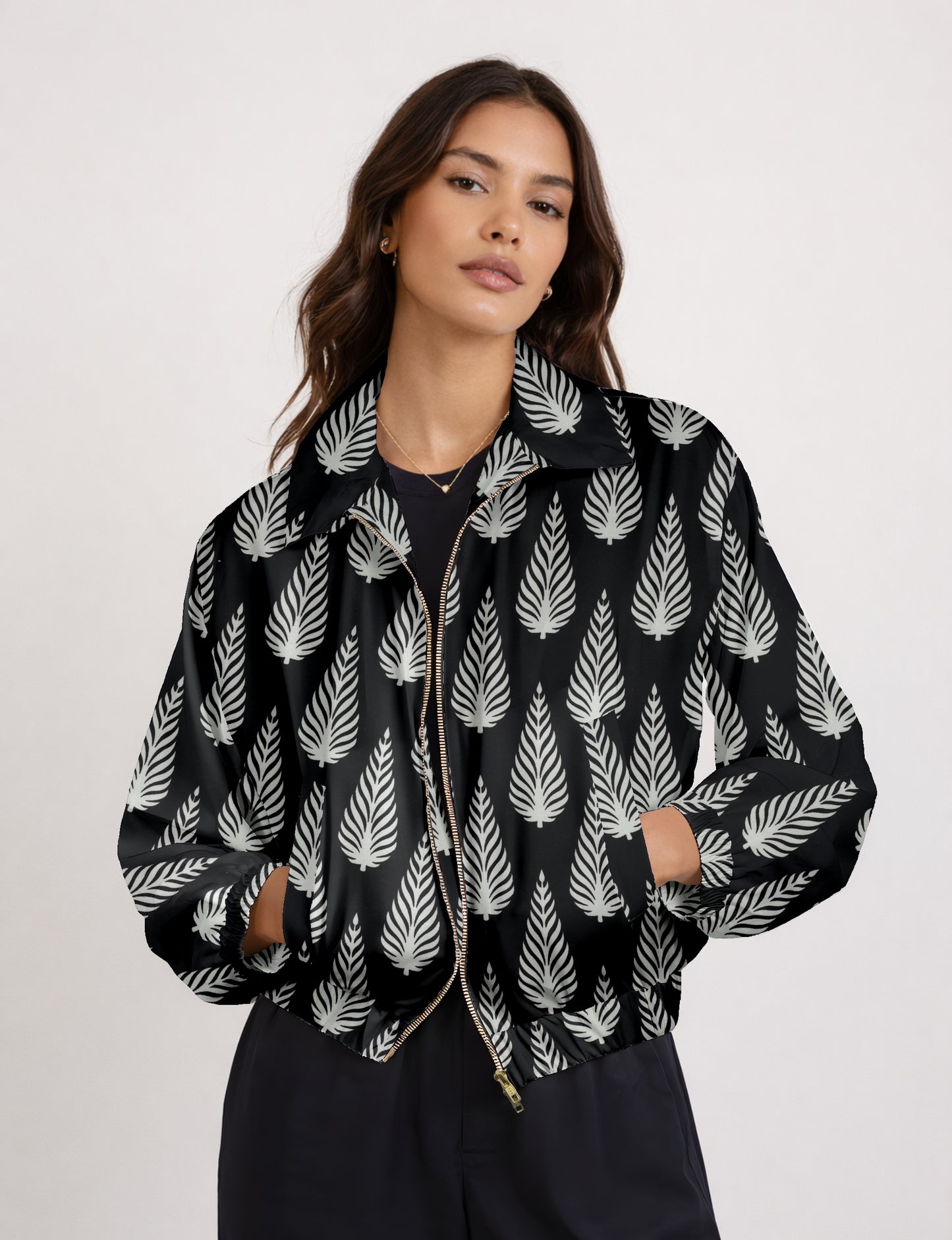Upcycled Bomber Jacket made from recycled sari materials, featuring a cute cropped shape, elasticated hem and cuffs, and contrast sari print lining. Sustainable apparel promoting eco-friendly fashion and ethical clothing.