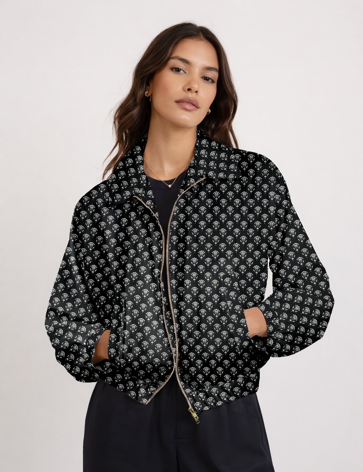 Upcycled Bomber Jacket made from recycled sari materials, featuring a cute cropped shape, elasticated hem and cuffs, and contrast sari print lining. Sustainable apparel promoting eco-friendly fashion and ethical clothing.