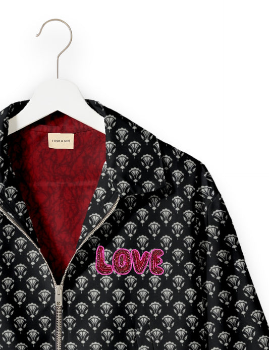 Love Bomber Jacket made from recycled fabric, featuring hand-stitched Aari embroidery. A unique piece of zero-waste clothing, part of the circular fashion movement. Designed with upcycled materials for a stylish yet environmentally friendly clothing choice.
