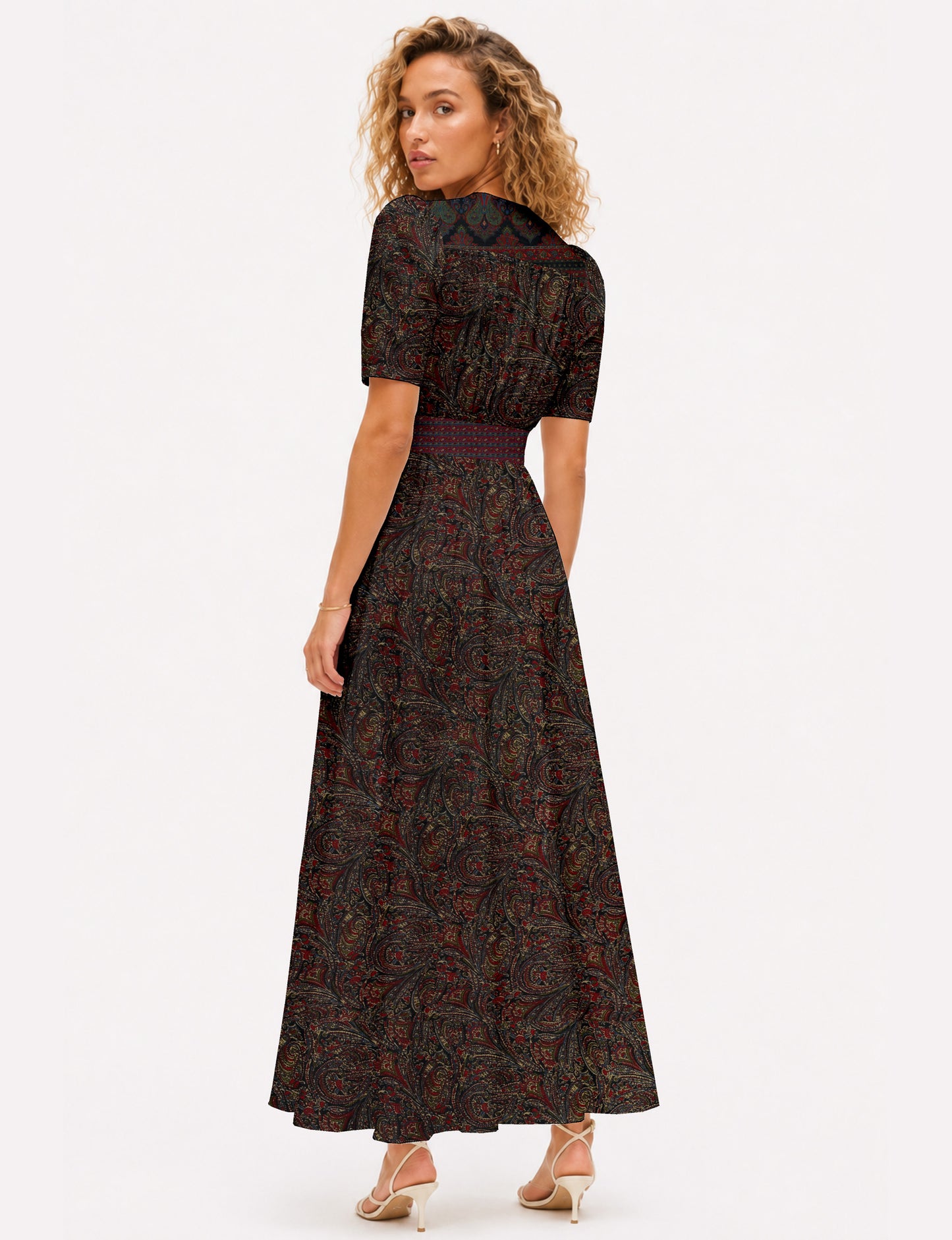 Maxi romantic dress with a fitted bodice, V-neckline, functional button placket, structured waist panel, short sleeves, and a softly flared ankle-length A-line skirt.