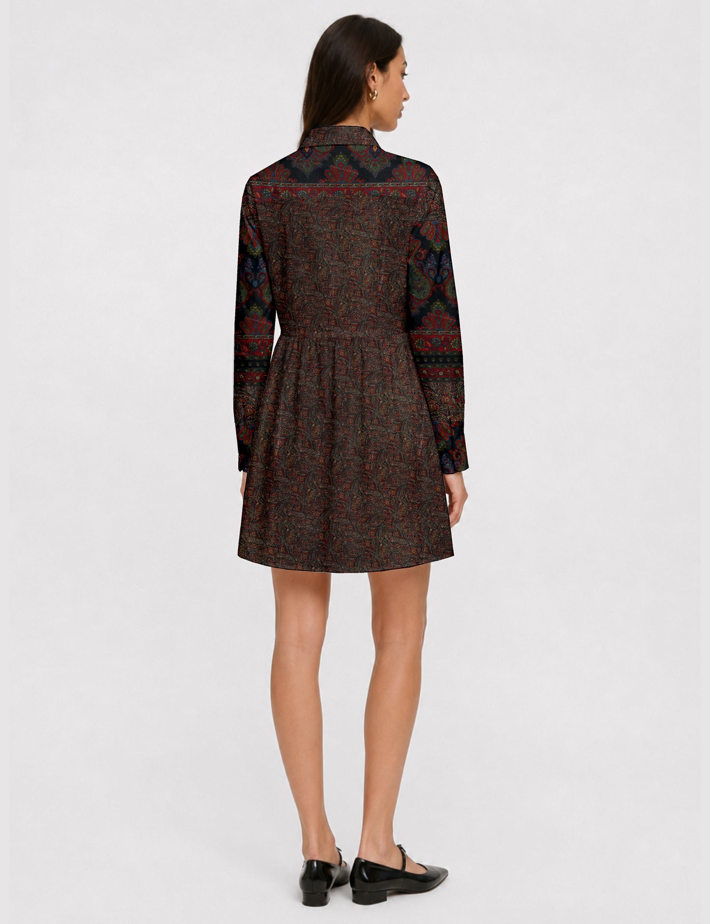 Short shirt dress with a relaxed A-line silhouette, point collar, partial button placket, gathered waist, side pockets, and full-length cuffed sleeves.
