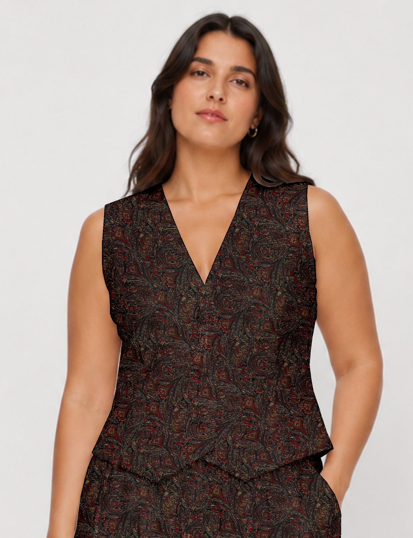 Women's fitted waistcoat with V-neck, single-breasted button closure, tailored silhouette, and pointed hem in sustainable fashion.