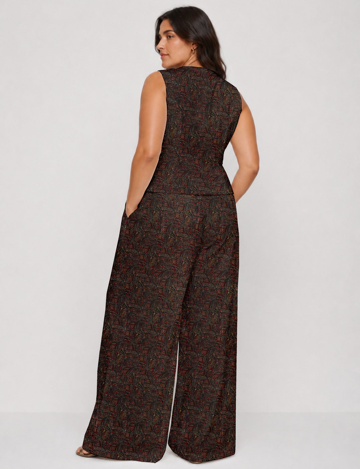 Women's tailored waistcoat set with a sleeveless V-neck button-front waistcoat and high-rise wide leg trousers in a coordinated matching outfit.