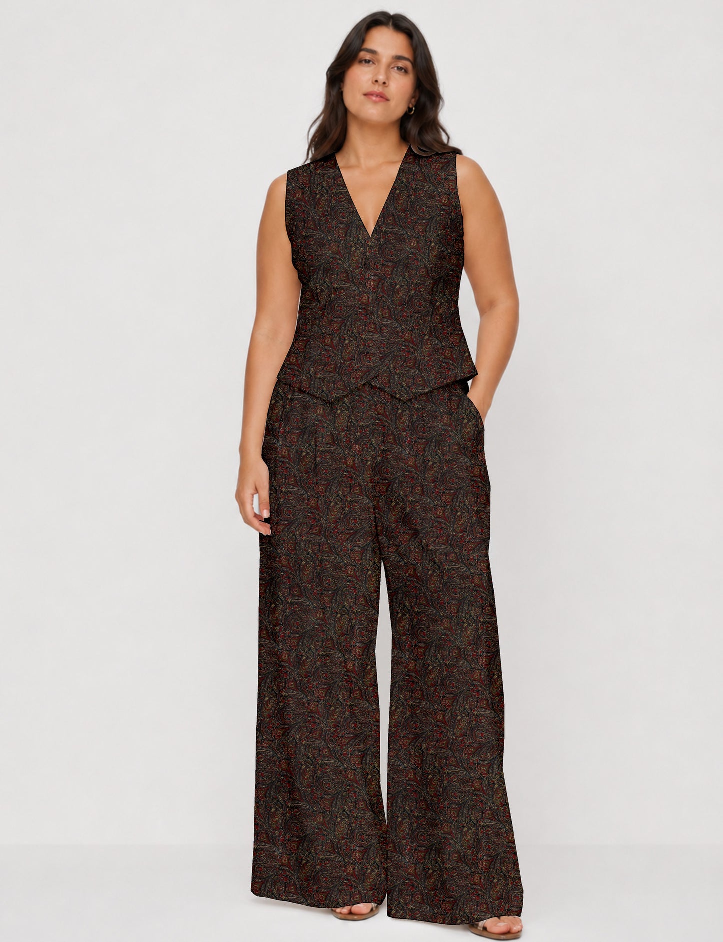 Women's tailored waistcoat set with a sleeveless V-neck button-front waistcoat and high-rise wide leg trousers in a coordinated matching outfit.