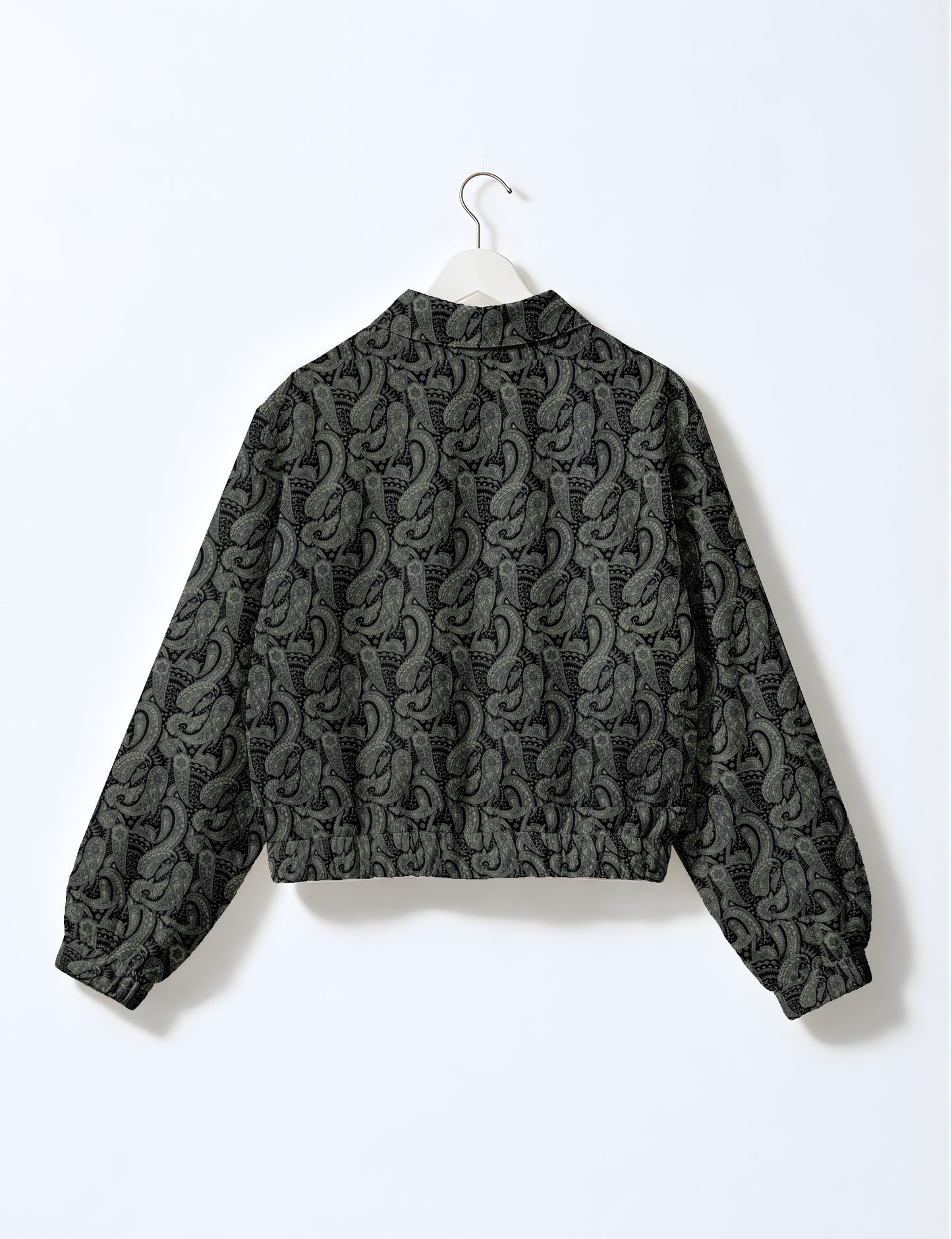 Yellow bomber jacket with micro diamond and floral pattern, elastic cuffs and waistband, shown from back on hanger