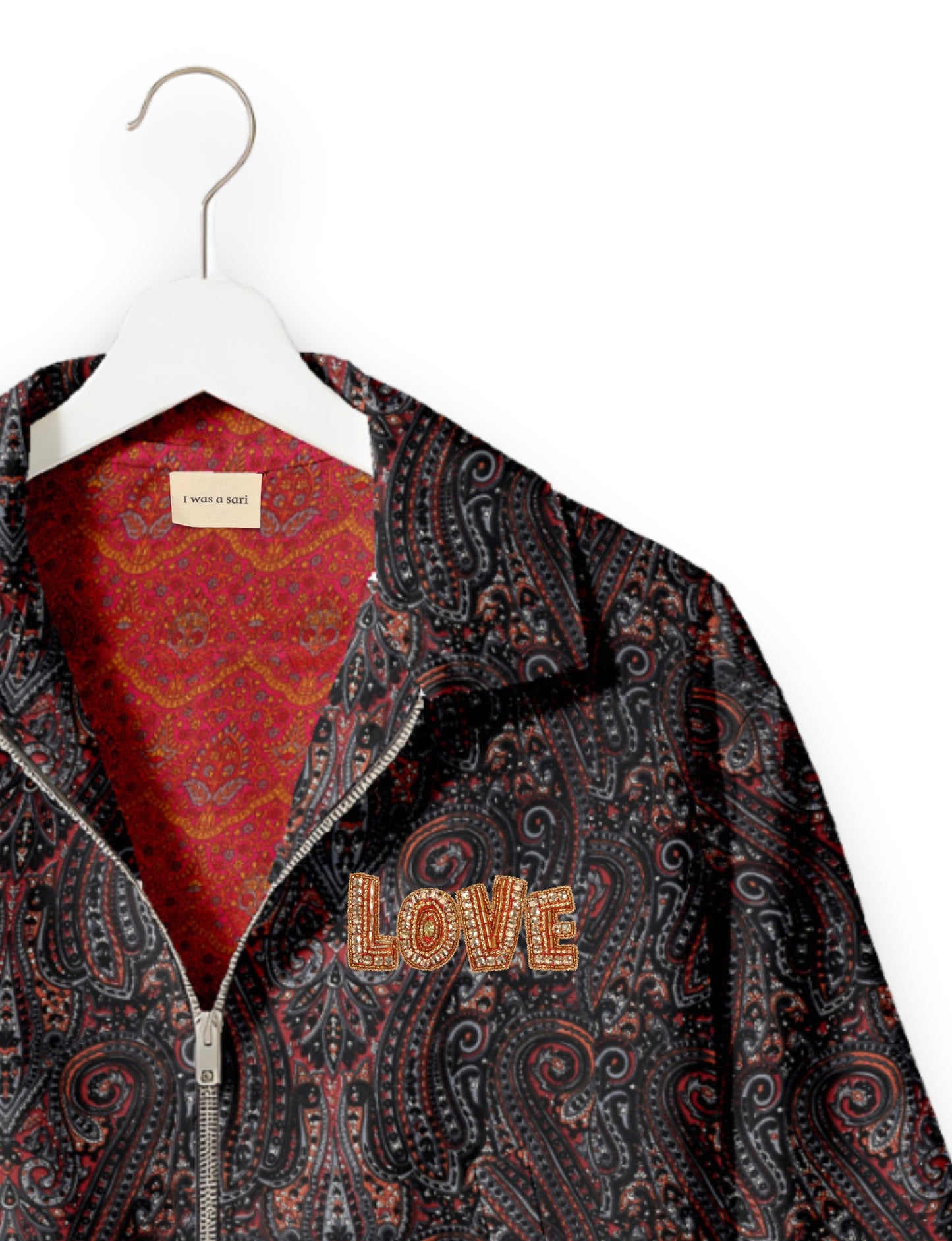Love Bomber Jacket made from recycled fabric, featuring hand-stitched Aari embroidery. A unique piece of zero-waste clothing, part of the circular fashion movement. Designed with upcycled materials for a stylish yet environmentally friendly clothing choice.