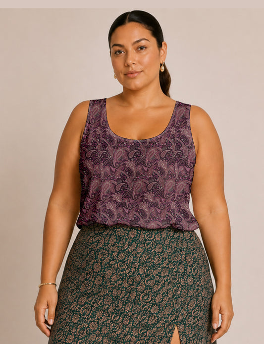 Women's sleeveless blouse with a relaxed straight fit, wide scoop neckline, deep scoop back, and hip-length silhouette.