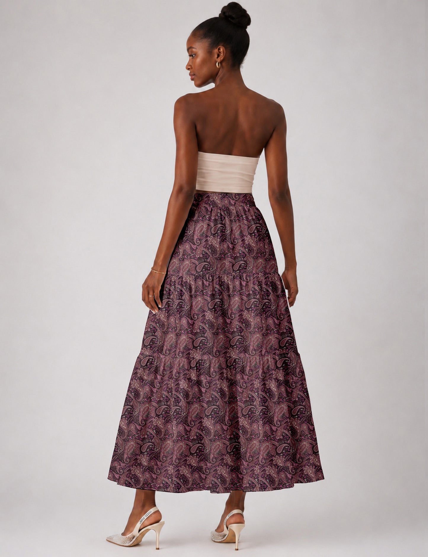 Yellow midi tiered skirt with small dark geometric micro pattern, flat lay front view