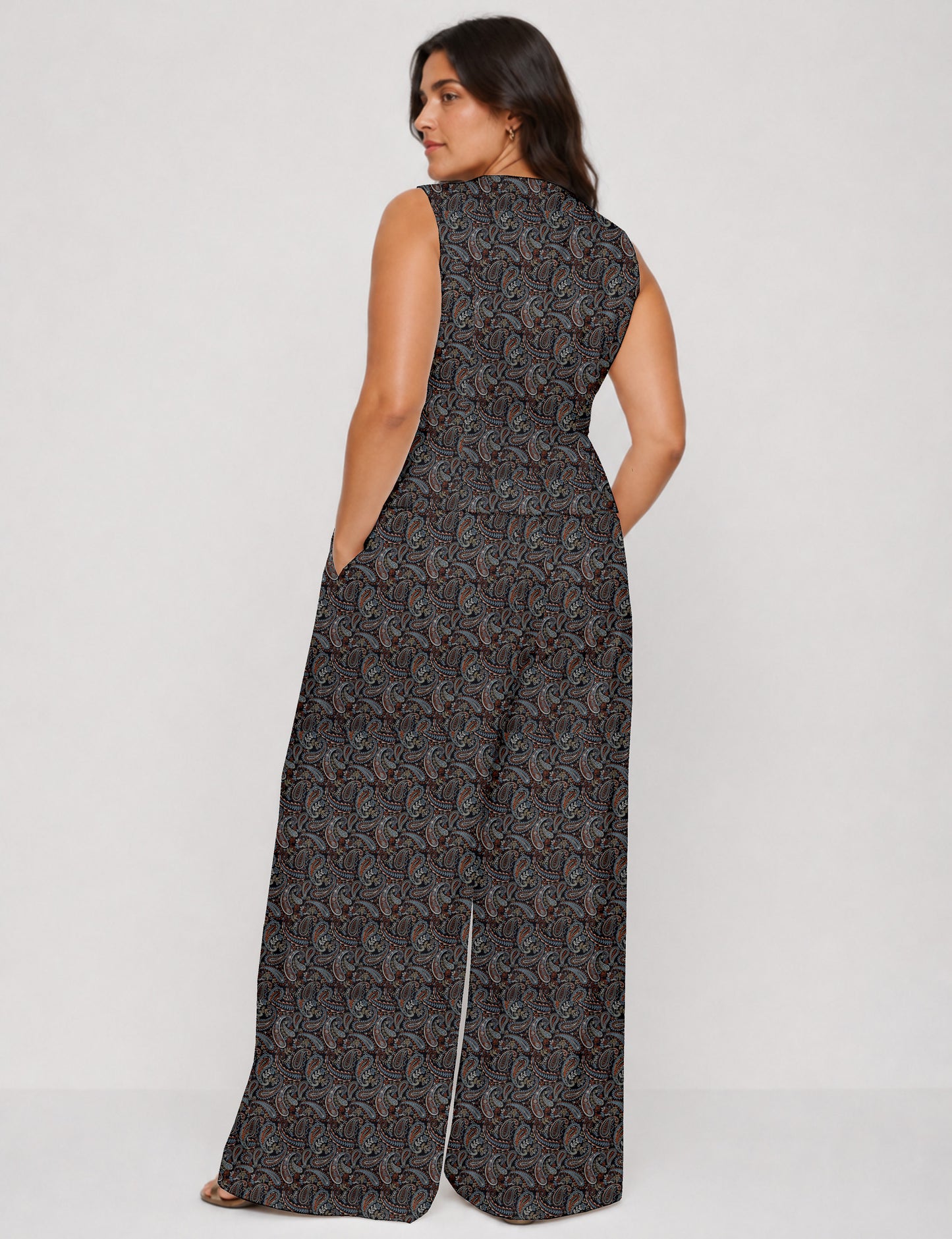Women's tailored waistcoat set with a sleeveless V-neck button-front waistcoat and high-rise wide leg trousers in a coordinated matching outfit.