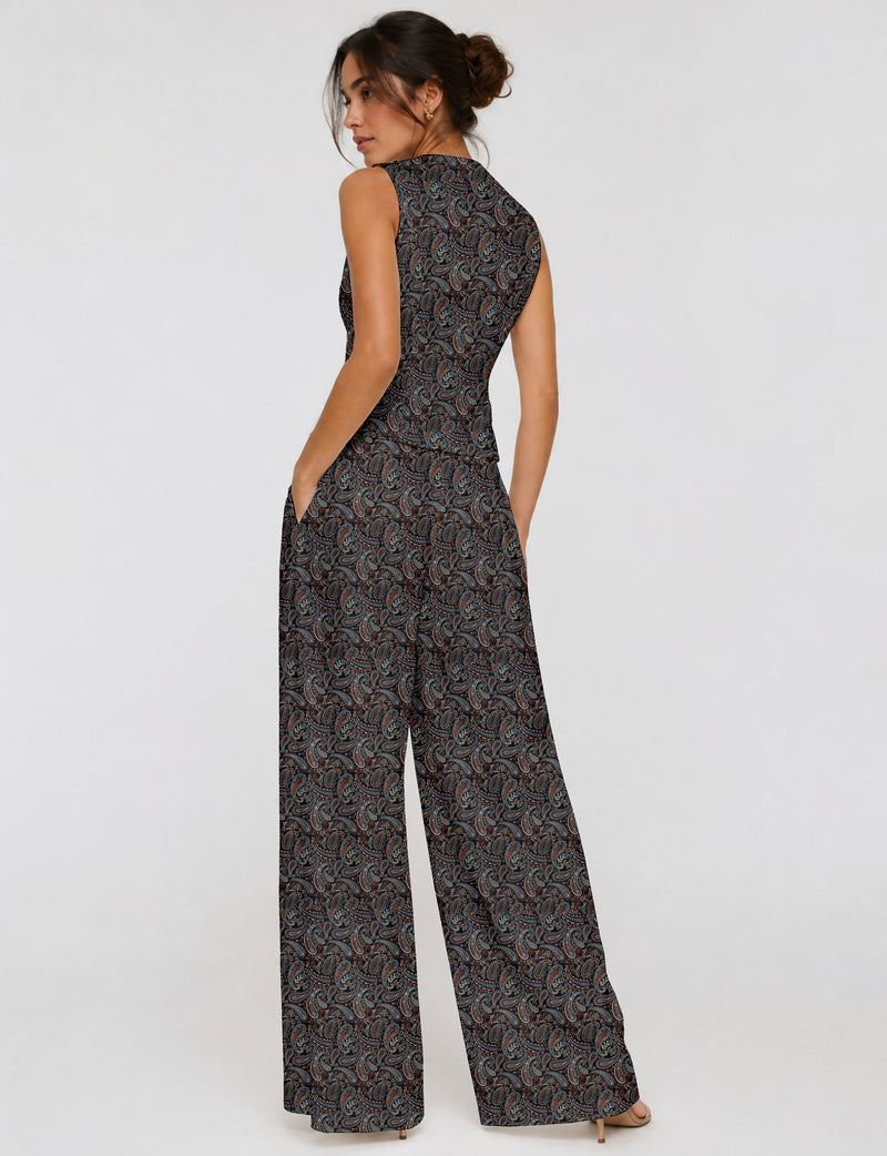 Women's tailored waistcoat set with a sleeveless V-neck button-front waistcoat and high-rise wide leg trousers in a coordinated matching outfit.