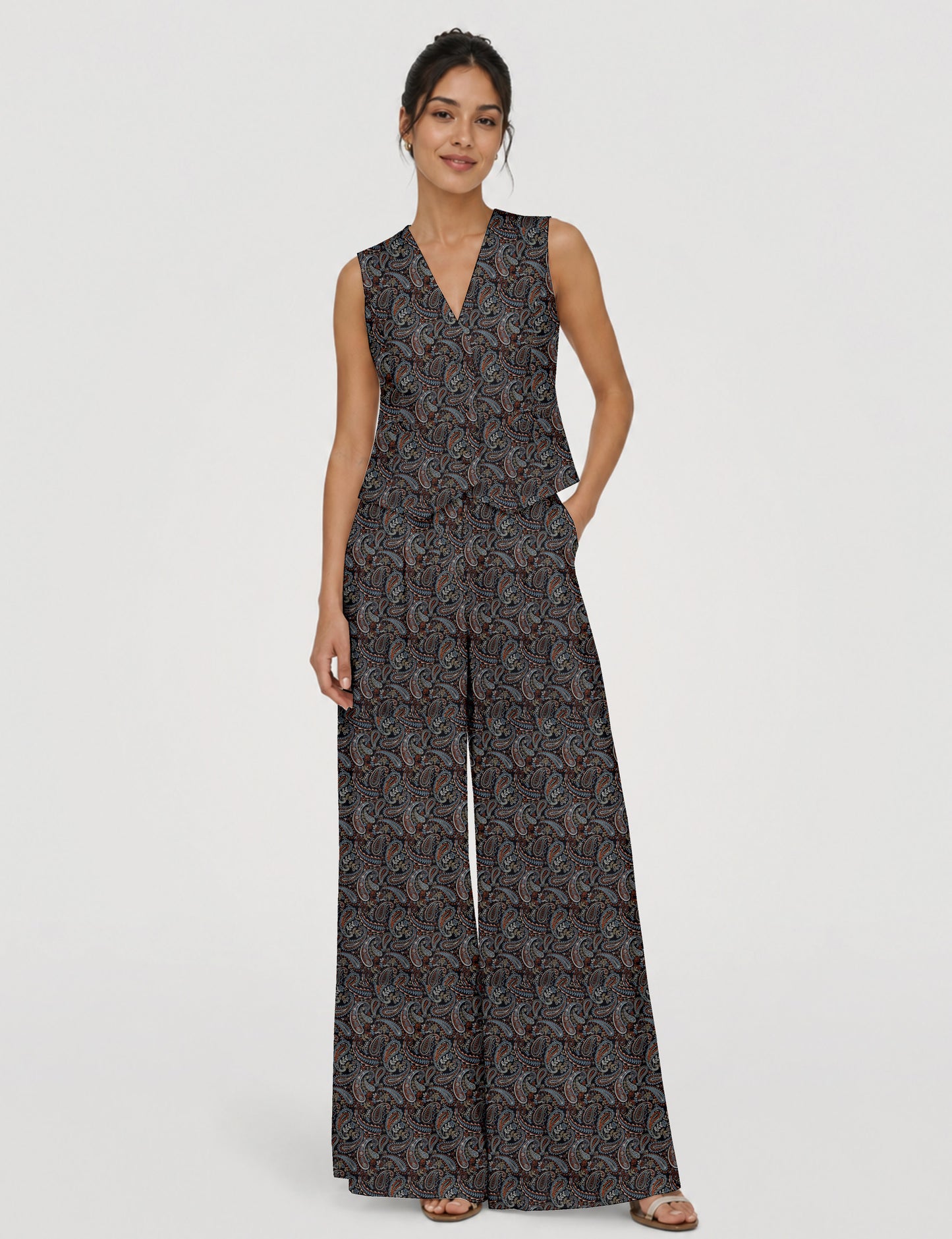 Women's tailored waistcoat set with a sleeveless V-neck button-front waistcoat and high-rise wide leg trousers in a coordinated matching outfit.