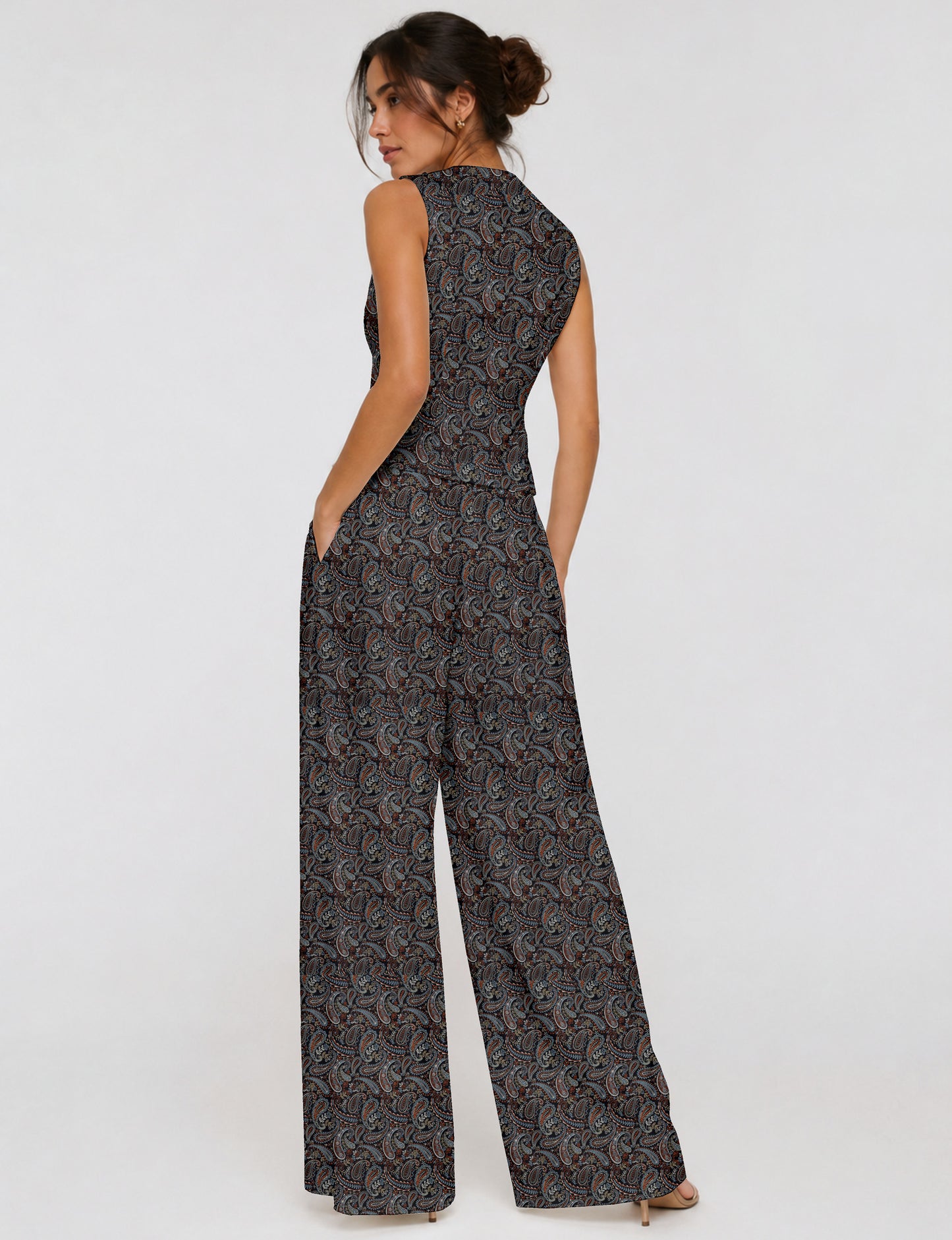 Women's tailored waistcoat set with a sleeveless V-neck button-front waistcoat and high-rise wide leg trousers in a coordinated matching outfit.