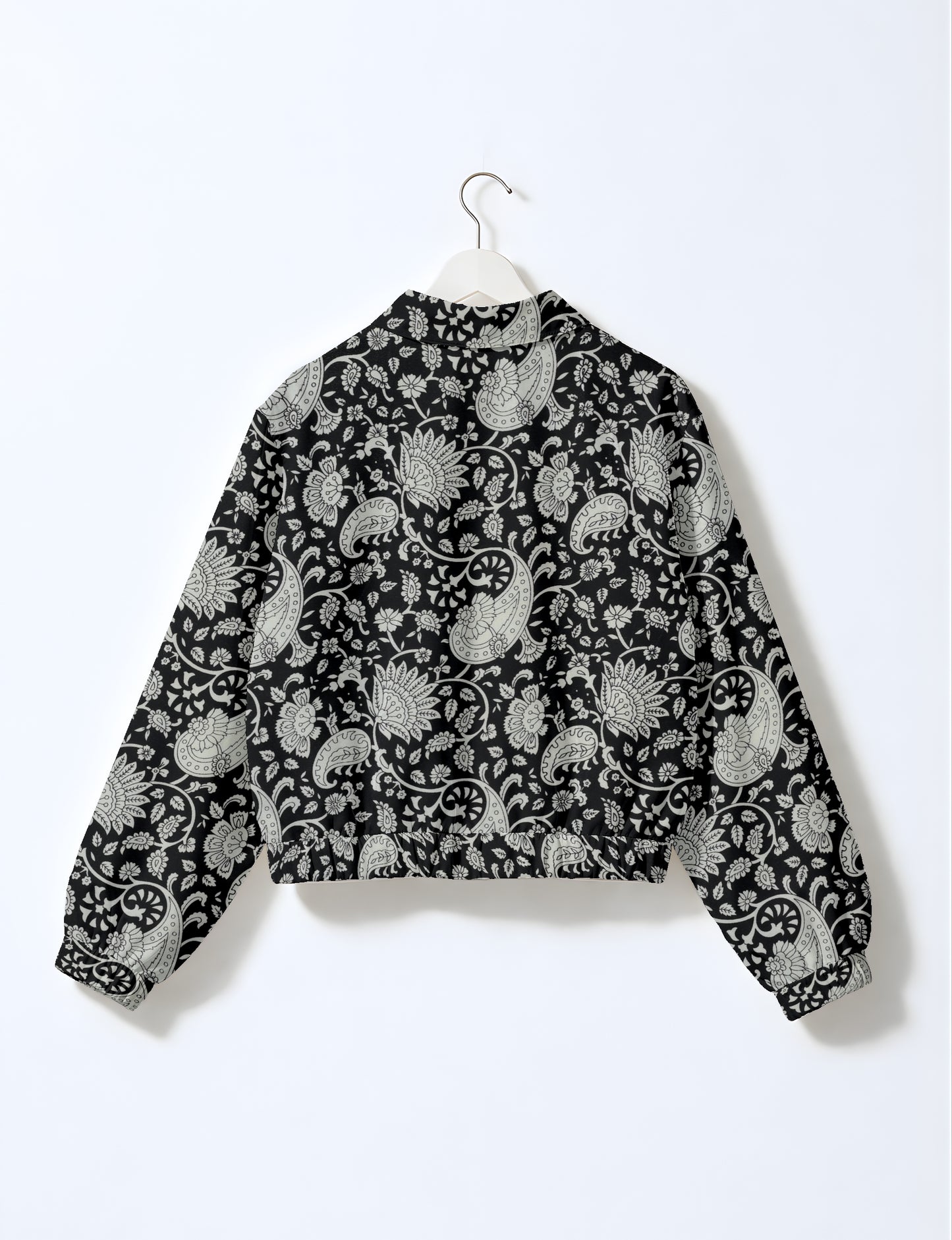 Upcycled Bomber Jacket made from recycled sari materials, featuring a cute cropped shape, elasticated hem and cuffs, and contrast sari print lining. Sustainable apparel promoting eco-friendly fashion and ethical clothing.