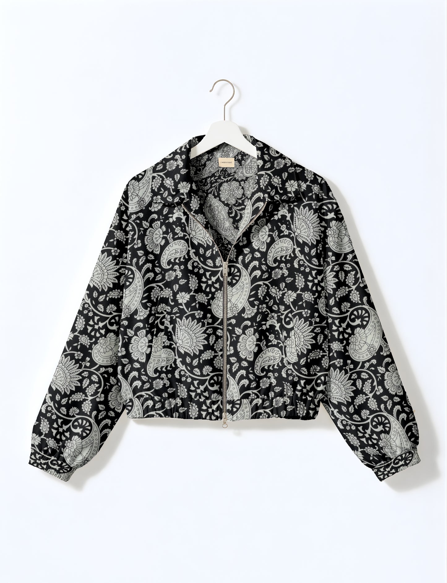 Upcycled Bomber Jacket made from recycled sari materials, featuring a cute cropped shape, elasticated hem and cuffs, and contrast sari print lining. Sustainable apparel promoting eco-friendly fashion and ethical clothing.