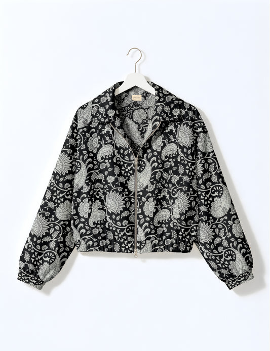 Upcycled Bomber Jacket made from recycled sari materials, featuring a cute cropped shape, elasticated hem and cuffs, and contrast sari print lining. Sustainable apparel promoting eco-friendly fashion and ethical clothing.