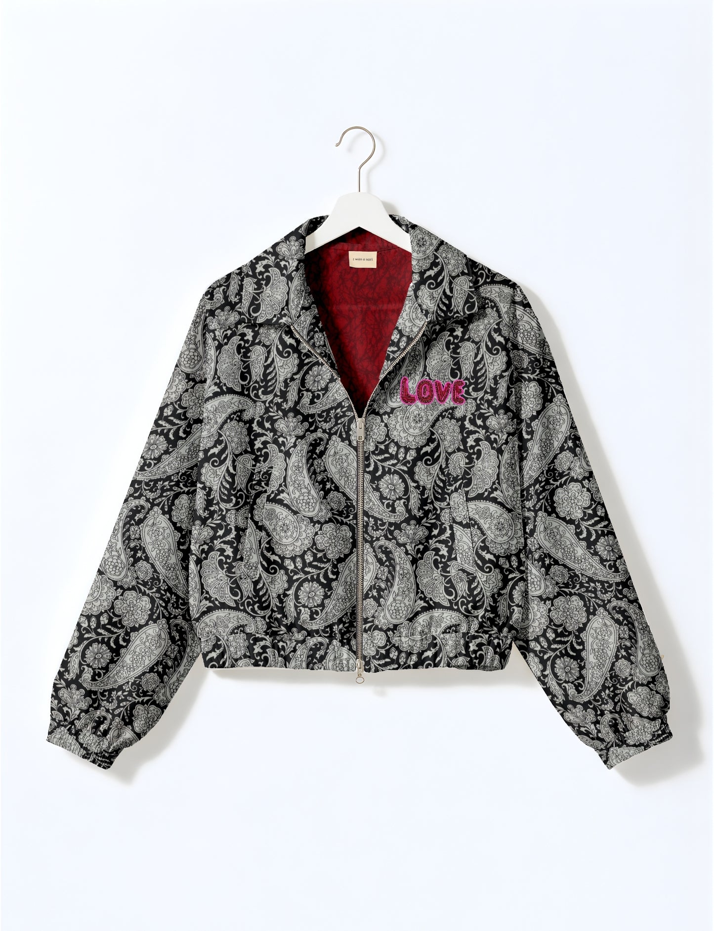 Love Bomber Jacket made from recycled fabric, featuring hand-stitched Aari embroidery. A unique piece of zero-waste clothing, part of the circular fashion movement. Designed with upcycled materials for a stylish yet environmentally friendly clothing choice.