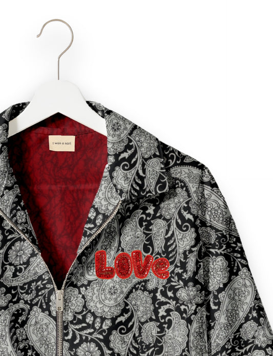 Love Bomber Jacket made from recycled fabric, featuring hand-stitched Aari embroidery. A unique piece of zero-waste clothing, part of the circular fashion movement. Designed with upcycled materials for a stylish yet environmentally friendly clothing choice.