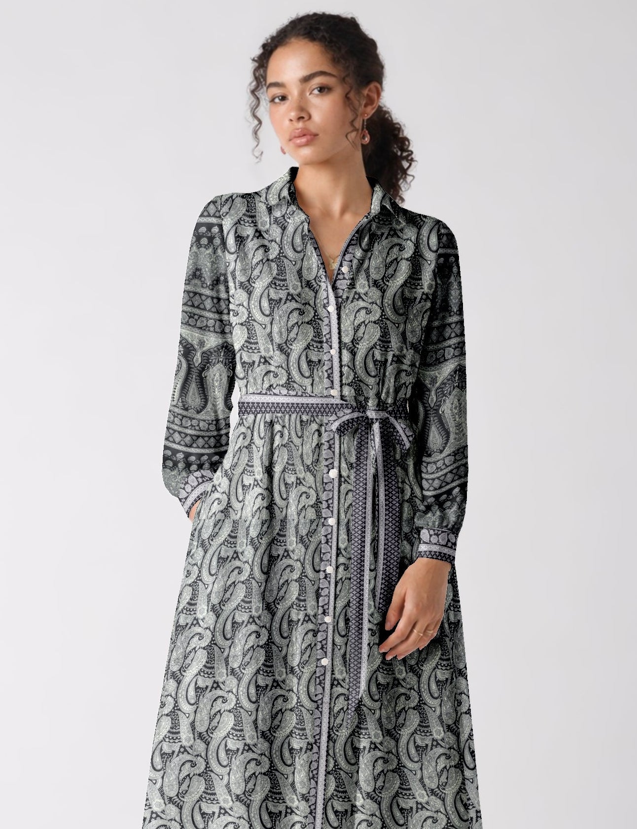 Long shirt dress side view highlighting flared silhouette