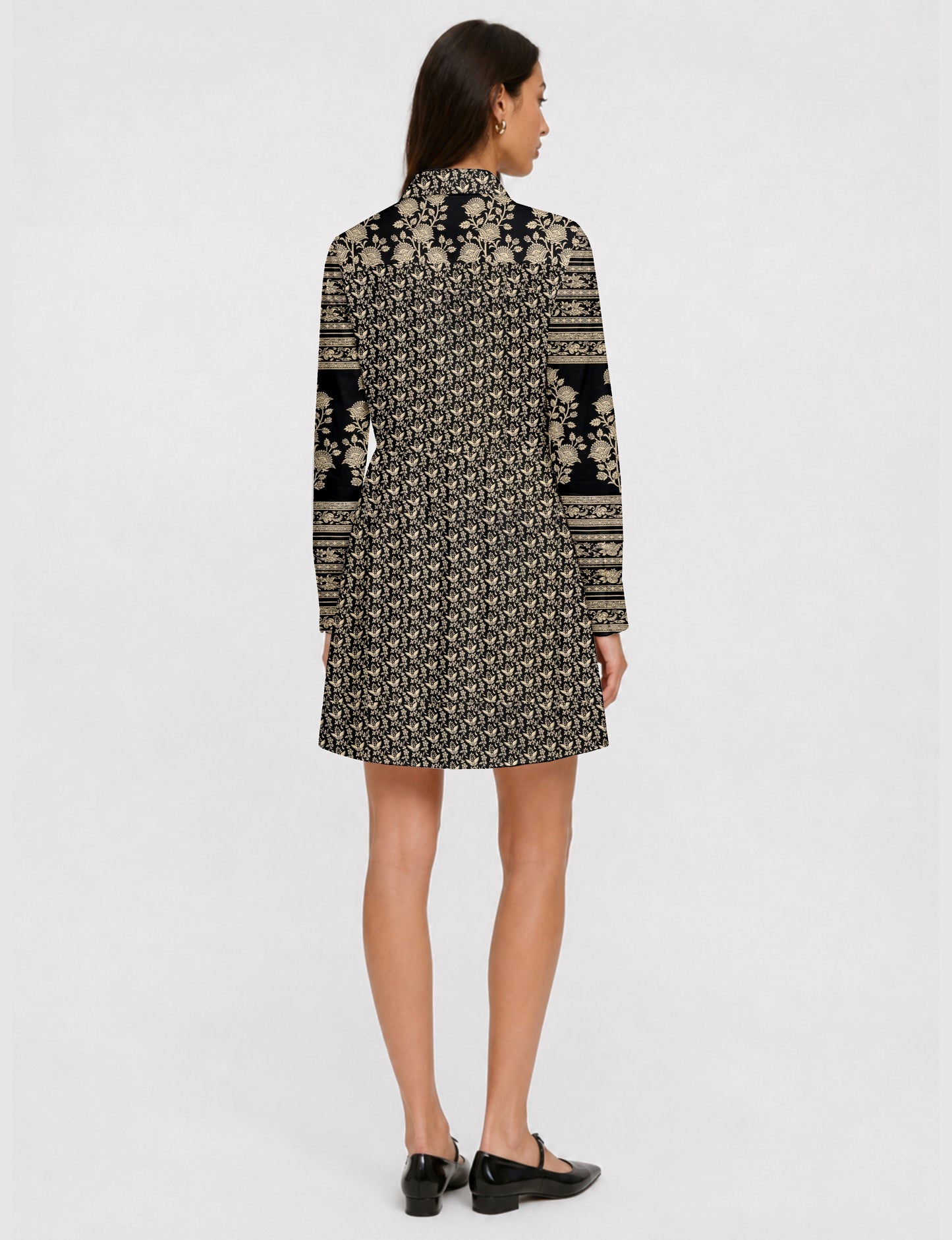 Short shirt dress with a relaxed A-line silhouette, point collar, partial button placket, gathered waist, side pockets, and full-length cuffed sleeves.