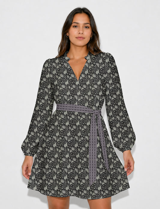 Swing dress with detachable tie belt, gathered ruffle neckline, full-length voluminous sleeves, elastic cuffs, and relaxed A-line silhouette in an above-knee length.
