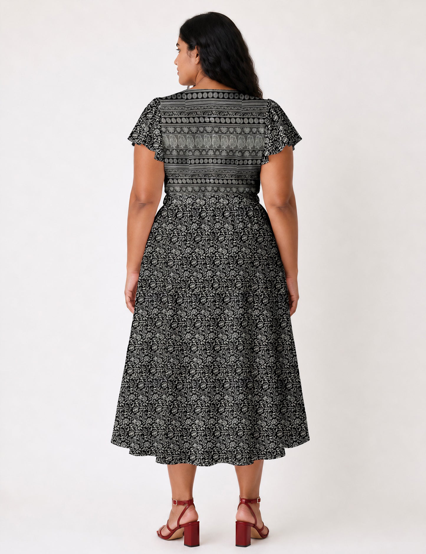 Elegant midi wrap dress with a V-neckline, adjustable waist tie, fitted bodice, and flared skirt for a timeless, flattering silhouette.