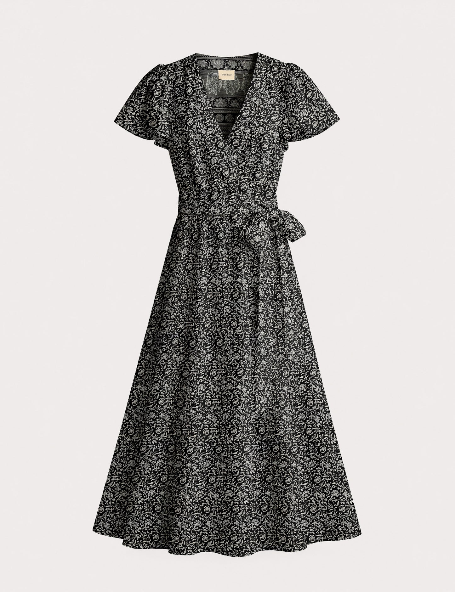 Elegant midi wrap dress with a V-neckline, adjustable waist tie, fitted bodice, and flared skirt for a timeless, flattering silhouette.