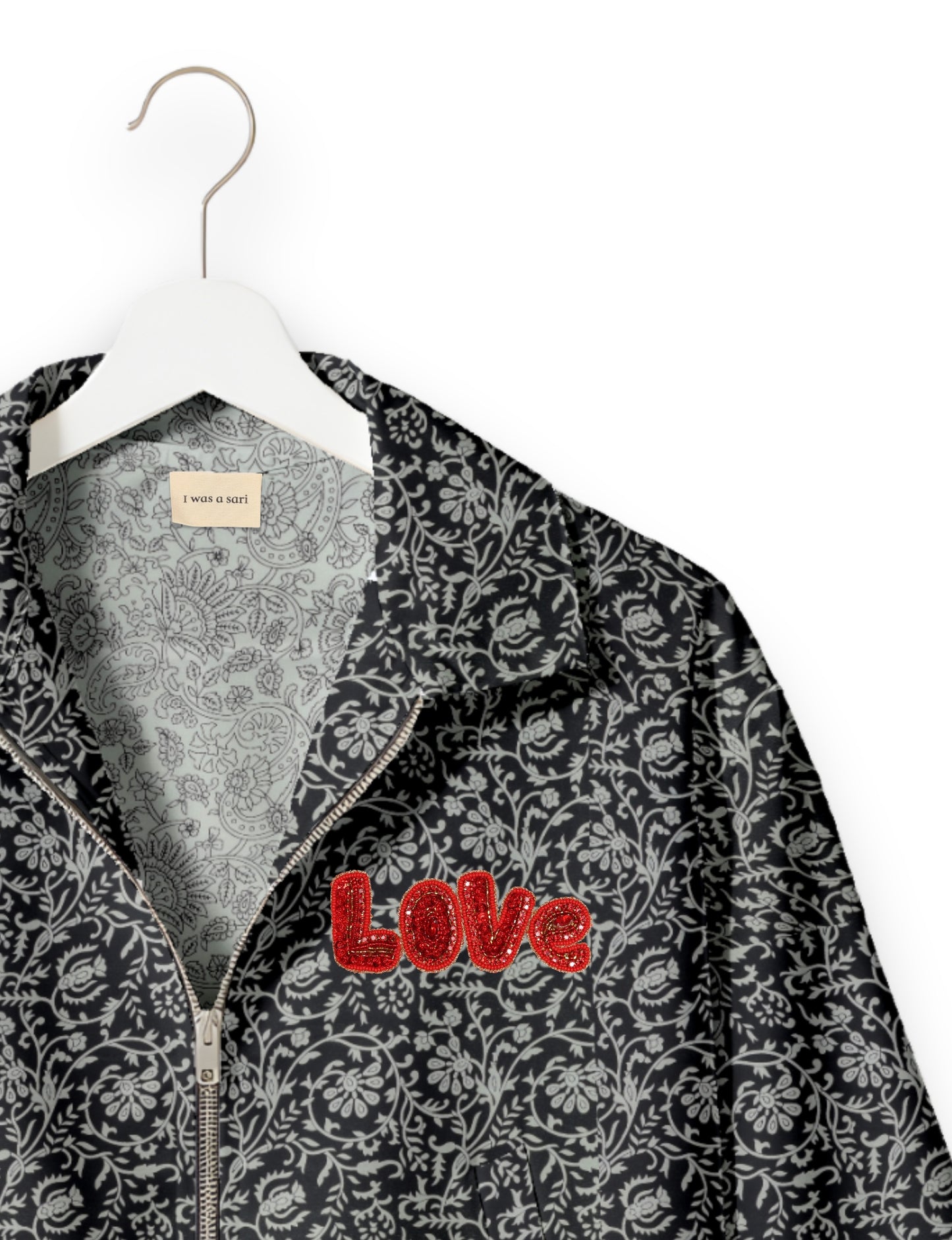 Love Bomber Jacket made from recycled fabric, featuring hand-stitched Aari embroidery. A unique piece of zero-waste clothing, part of the circular fashion movement. Designed with upcycled materials for a stylish yet environmentally friendly clothing choice.