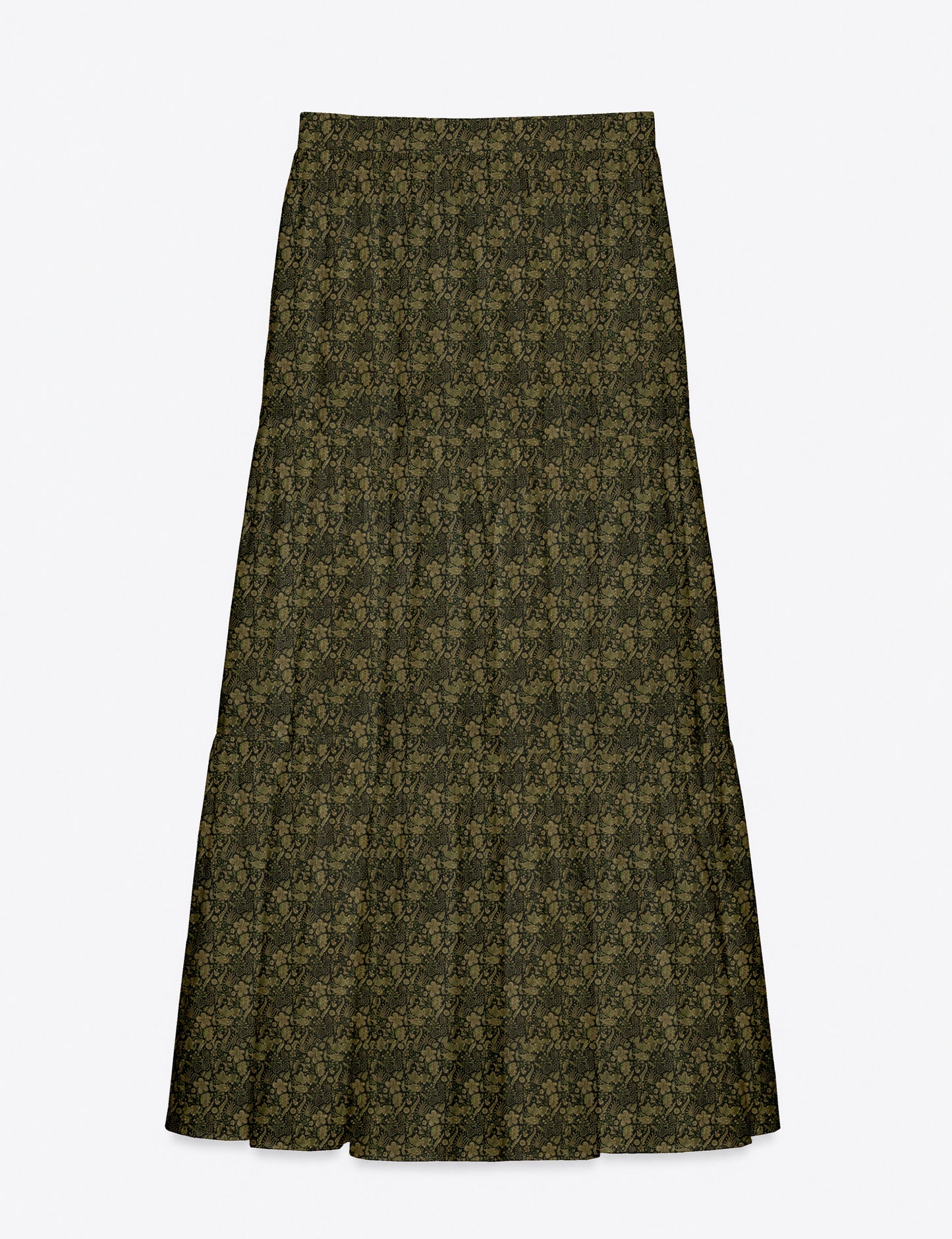 Woman wearing a yellow midi tiered skirt with a small geometric pattern, shown from the back, paired with beige top and