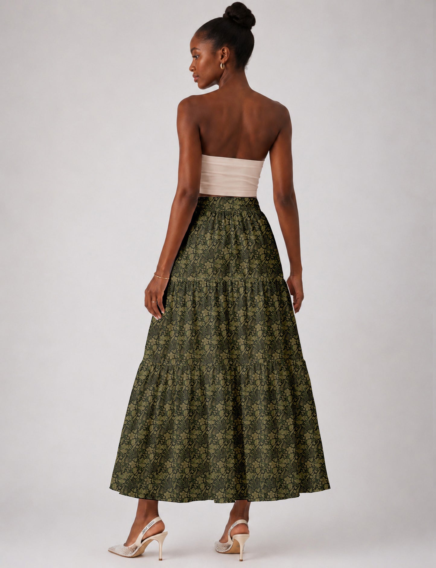 Yellow midi tiered skirt with small dark geometric micro pattern, flat lay front view