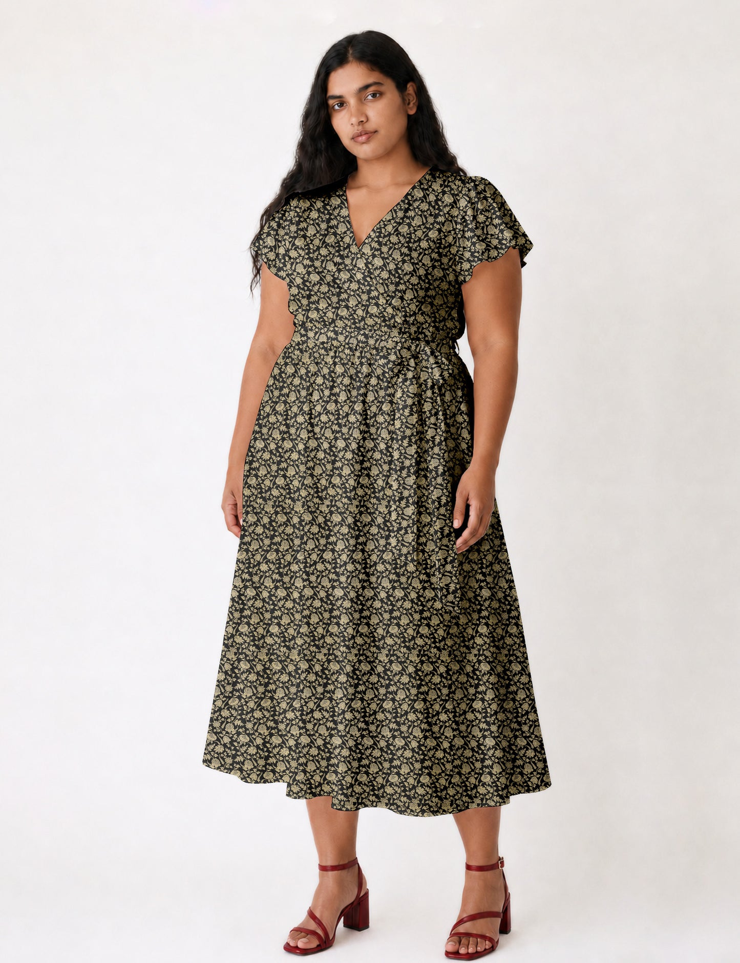 Elegant midi wrap dress with a V-neckline, adjustable waist tie, fitted bodice, and flared skirt for a timeless, flattering silhouette.