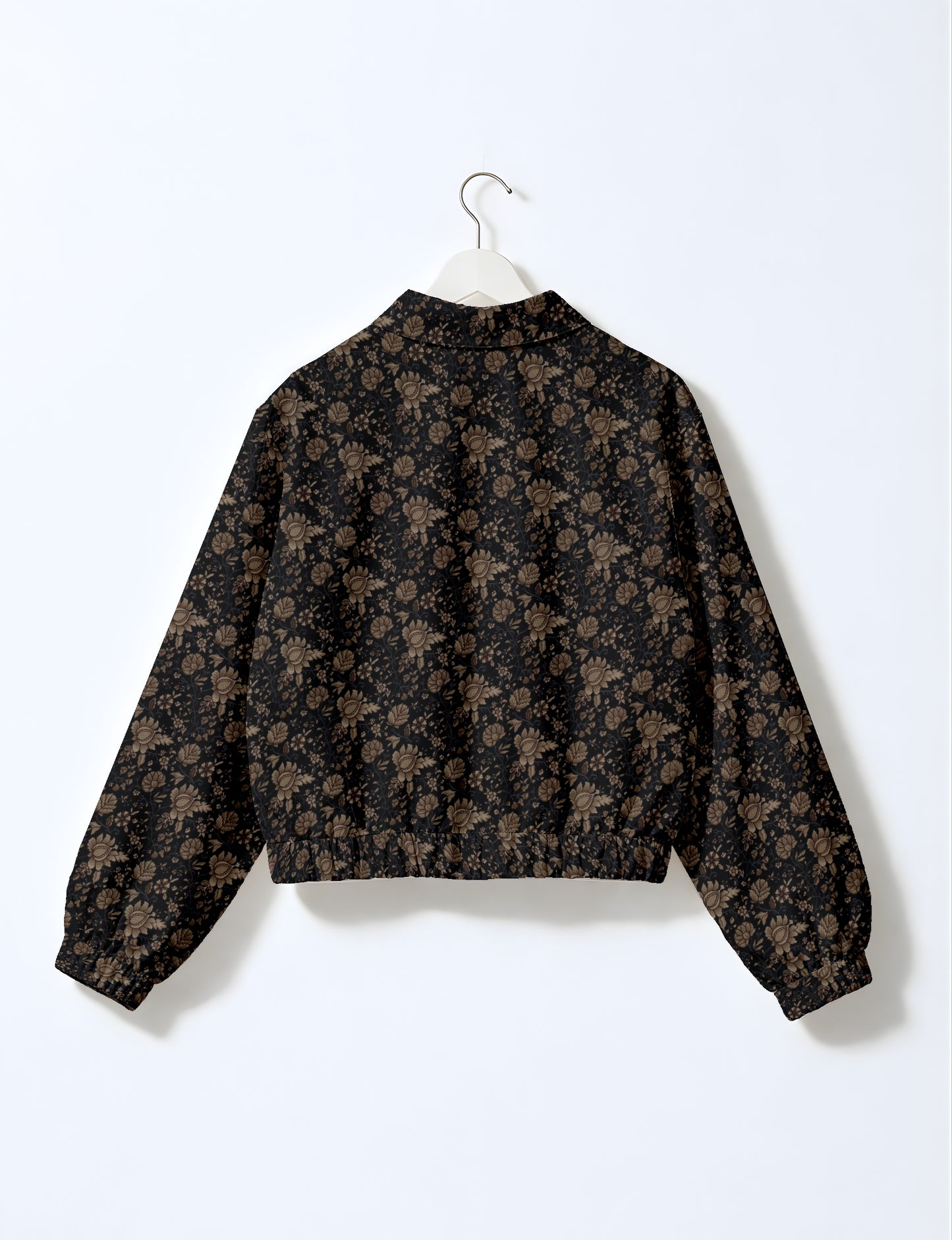 Upcycled Bomber Jacket made from recycled sari materials, featuring a cute cropped shape, elasticated hem and cuffs, and contrast sari print lining. Sustainable apparel promoting eco-friendly fashion and ethical clothing.