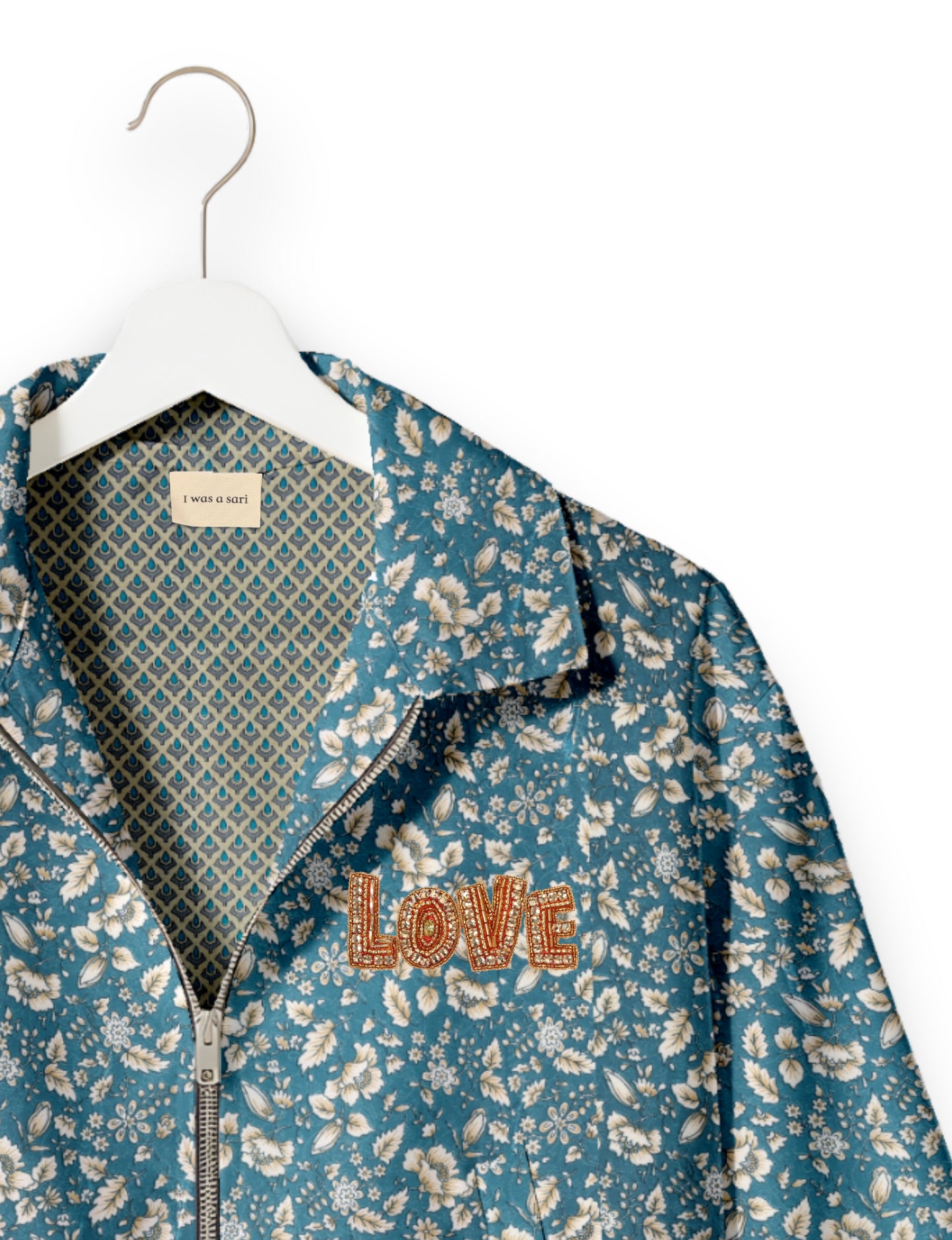 Love Bomber Jacket made from recycled fabric, featuring hand-stitched Aari embroidery. A unique piece of zero-waste clothing, part of the circular fashion movement. Designed with upcycled materials for a stylish yet environmentally friendly clothing choice.