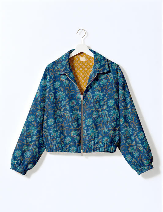 Upcycled Bomber Jacket made from recycled sari materials, featuring a cute cropped shape, elasticated hem and cuffs, and contrast sari print lining. Sustainable apparel promoting eco-friendly fashion and ethical clothing.