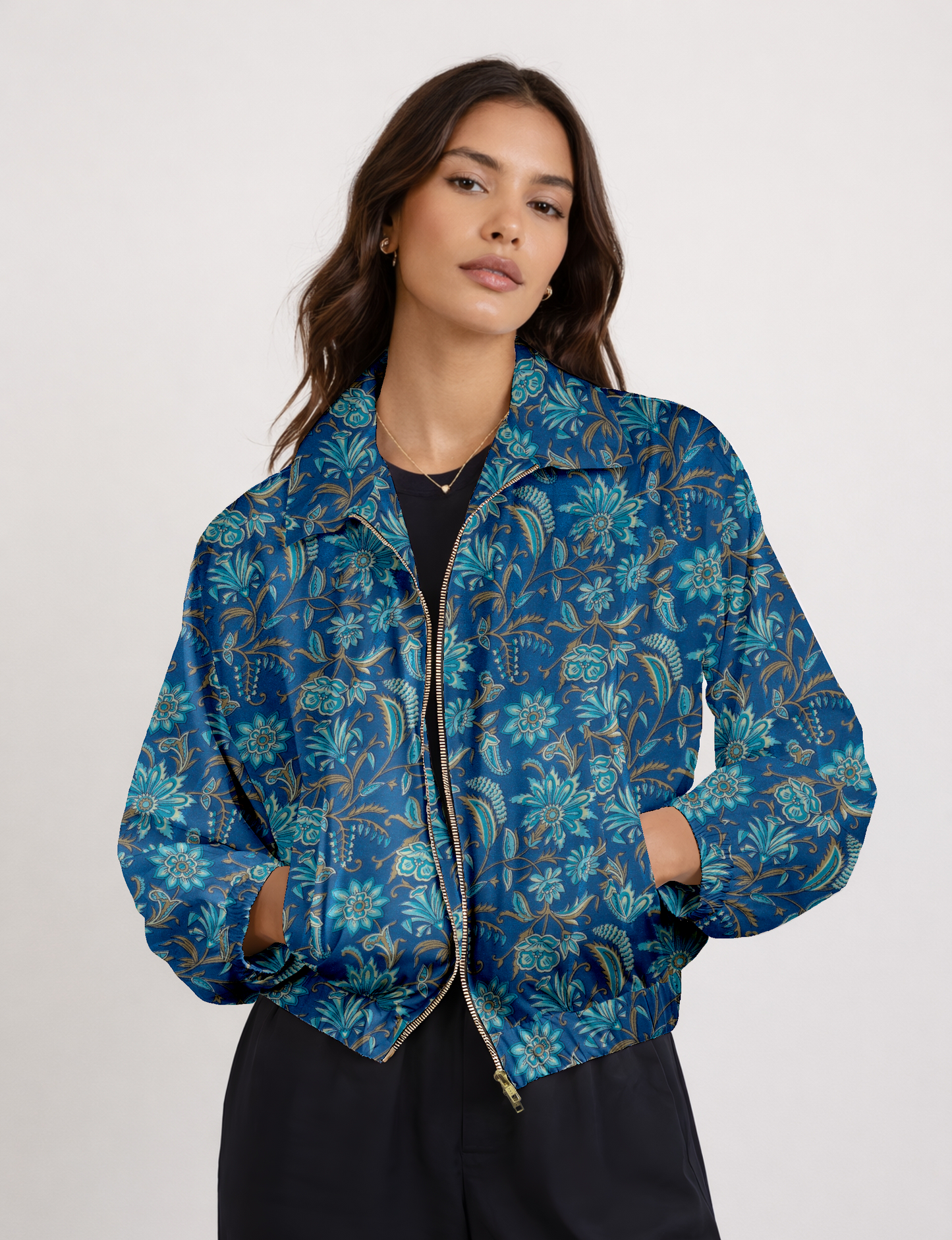 Upcycled Bomber Jacket made from recycled sari materials, featuring a cute cropped shape, elasticated hem and cuffs, and contrast sari print lining. Sustainable apparel promoting eco-friendly fashion and ethical clothing.