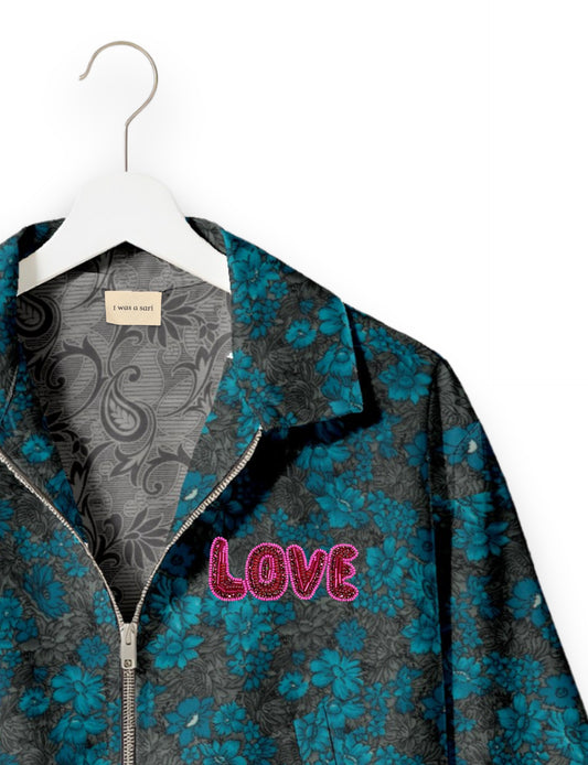 Love Bomber Jacket made from recycled fabric, featuring hand-stitched Aari embroidery. A unique piece of zero-waste clothing, part of the circular fashion movement. Designed with upcycled materials for a stylish yet environmentally friendly clothing choice.